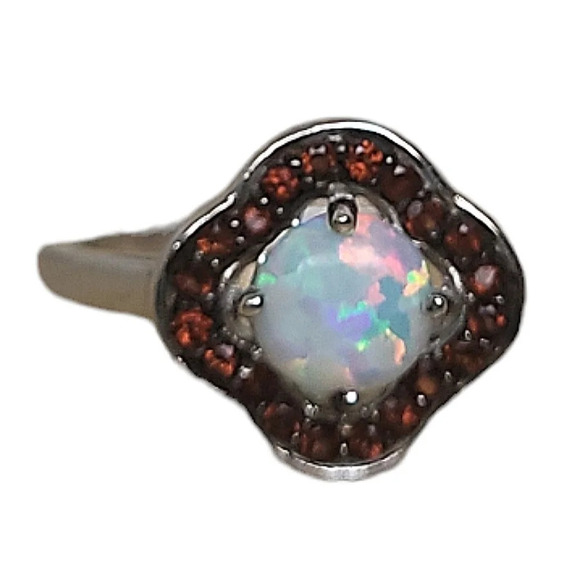 Sterling Silver Garnet Created White Opal Flower Ring - Picture 2 of 16
